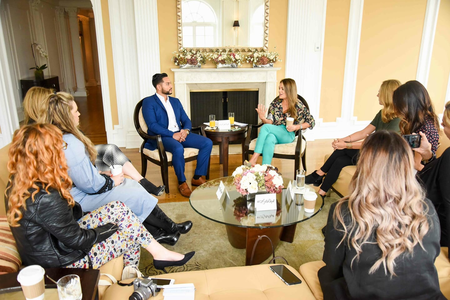 A small group of guests seated to hear Melissa Soto speak at an intimate Century 21 session in a salon at the Beverly Wilshire hotel in Beverly Hills