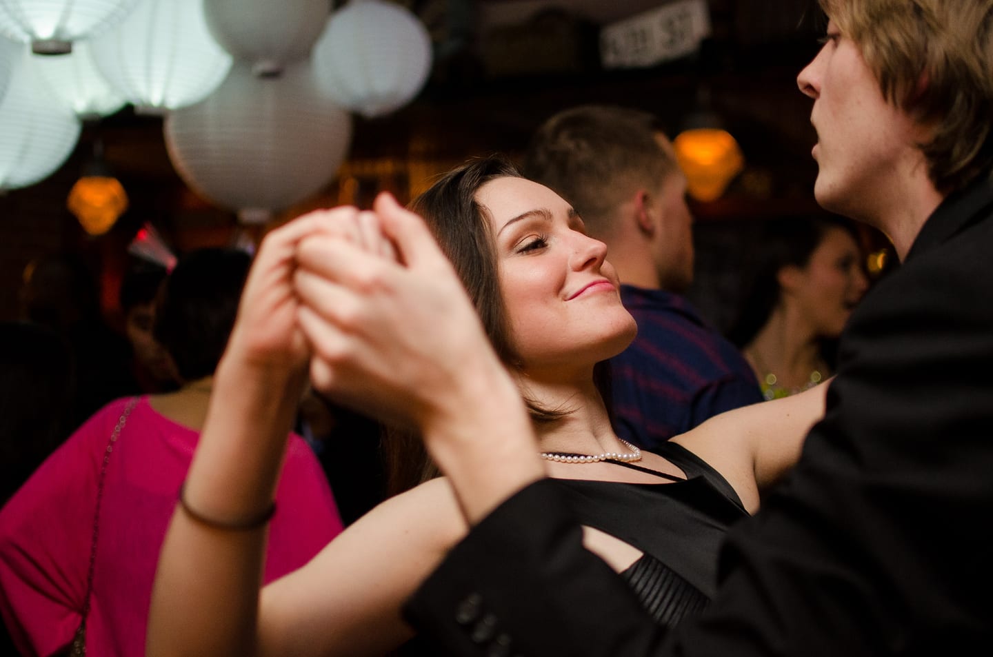 Couple dancing together at a party
