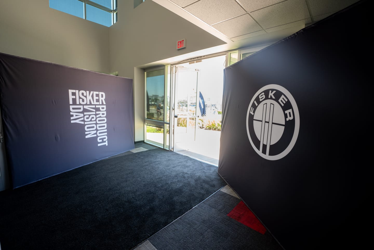 Fisker Product Vision Day banners flanking the entrance doors