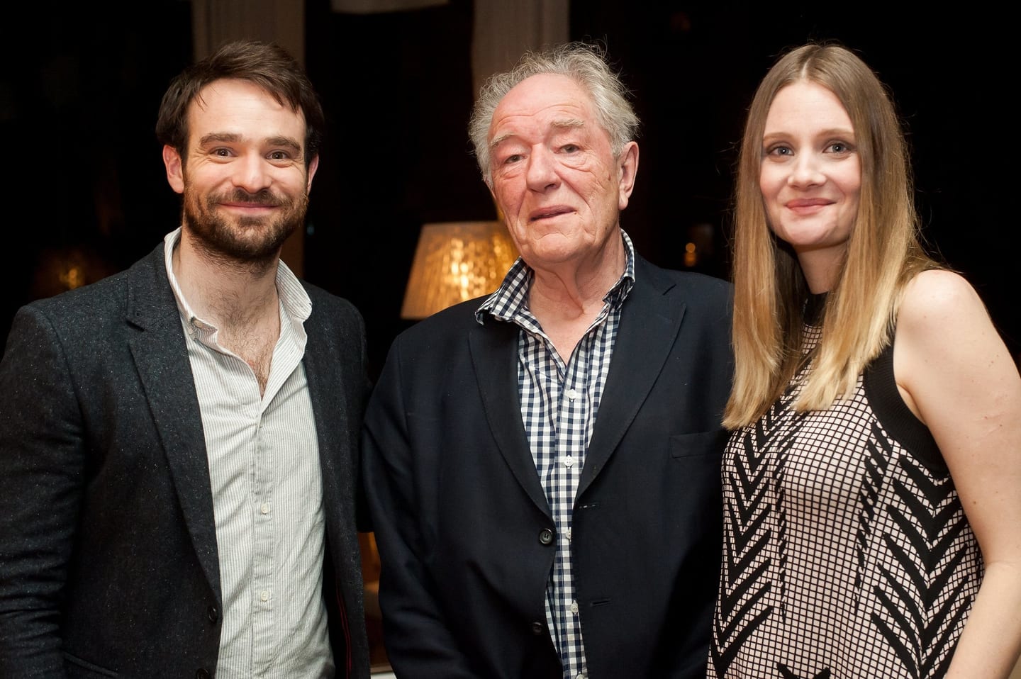 Actors Charlie Cox and Michael Gambon with a guest at a PBS event