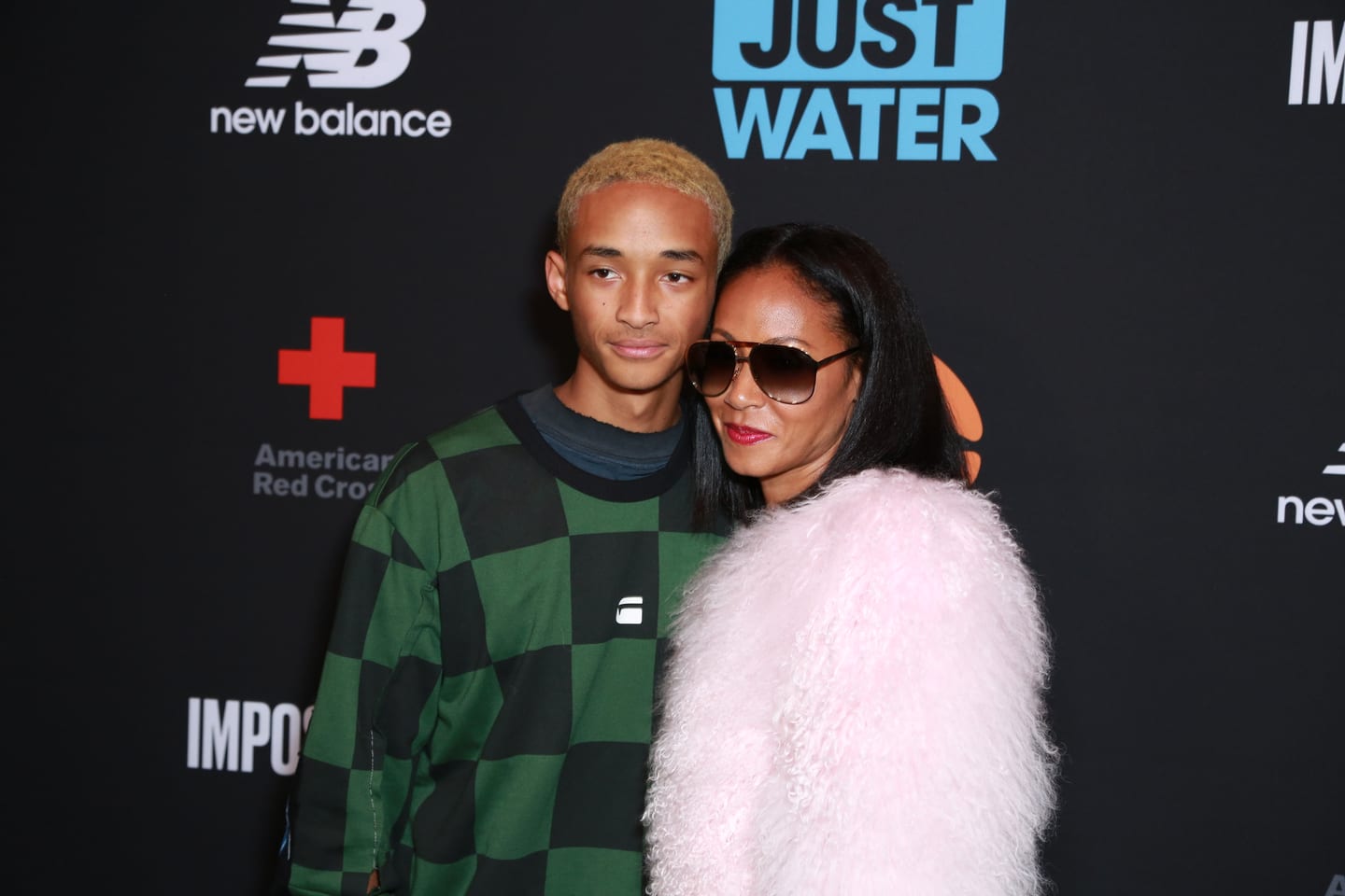 Jaden Smith and Jada Pinkett Smith on the carpet at a JUST Water event