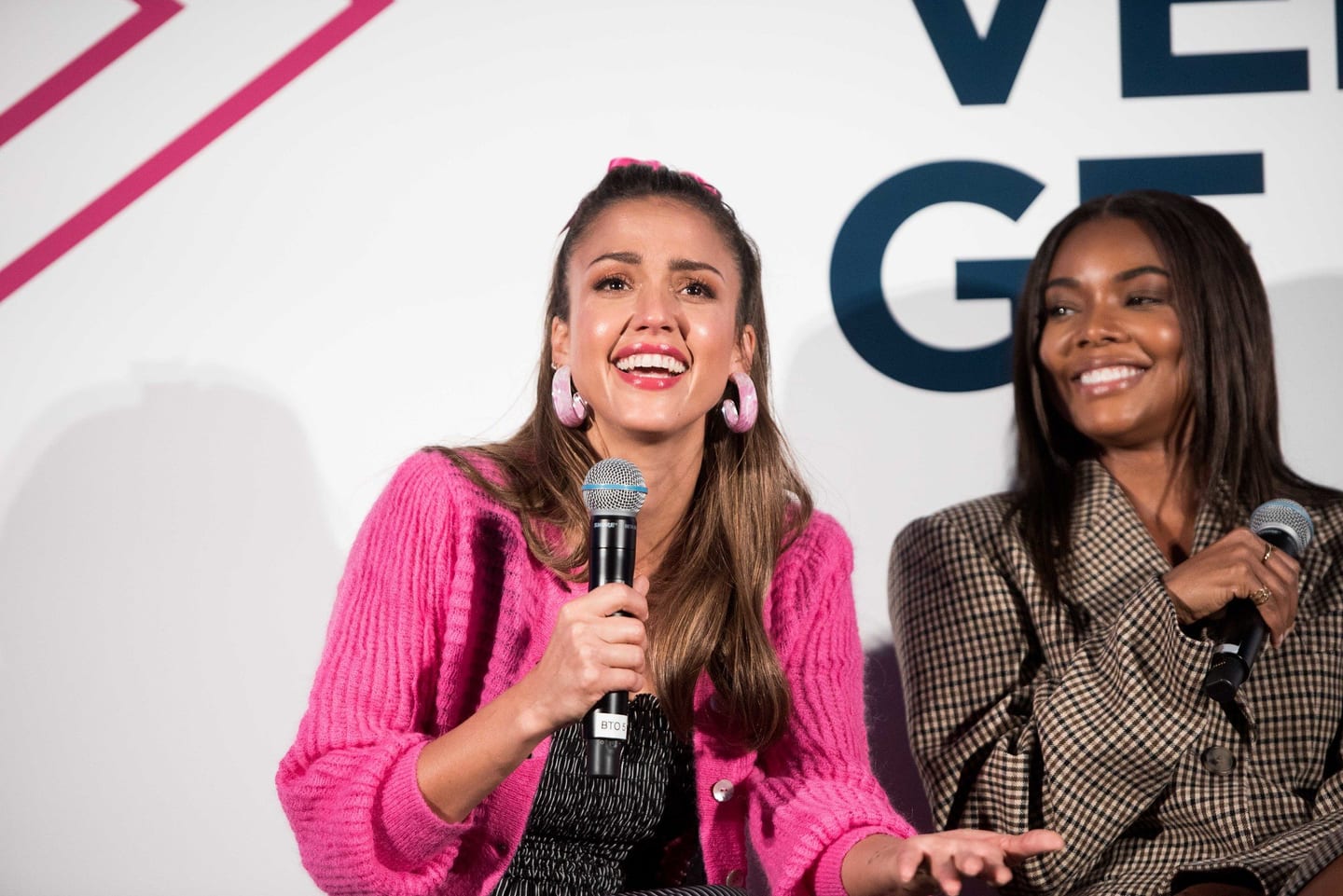 Jessica Alba and Gabrielle Union on stage at a panel event in Century City
