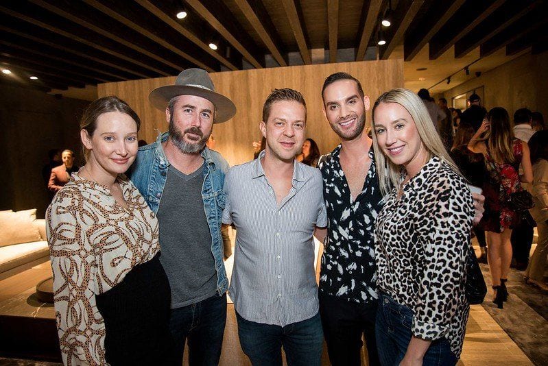 Five well-dressed guests together at the Molteni&C and Dada design event in Beverly Hills