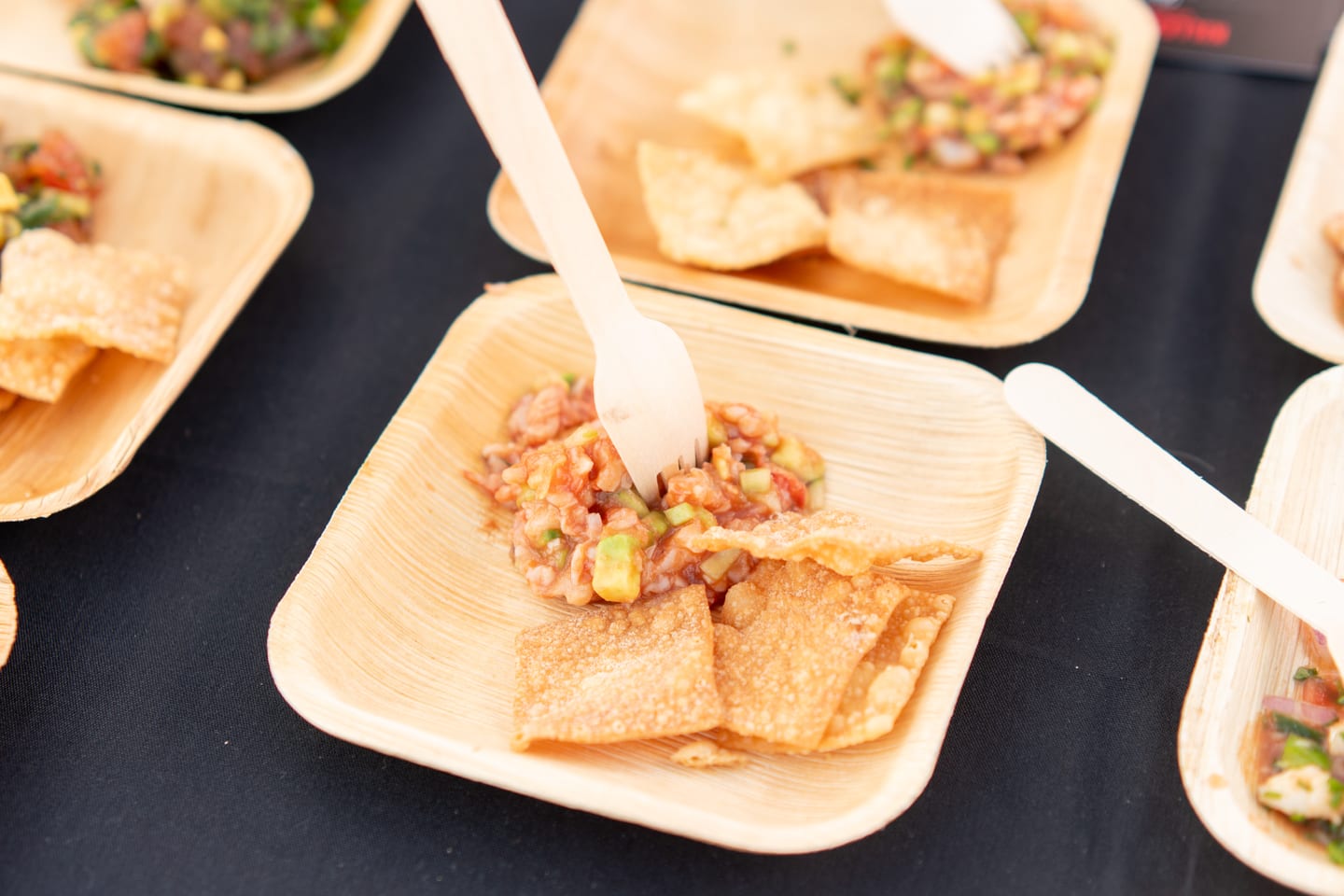 A tasting plate of tuna tartare with avocado and crispy wonton chips at the Off the Hook seafood festival