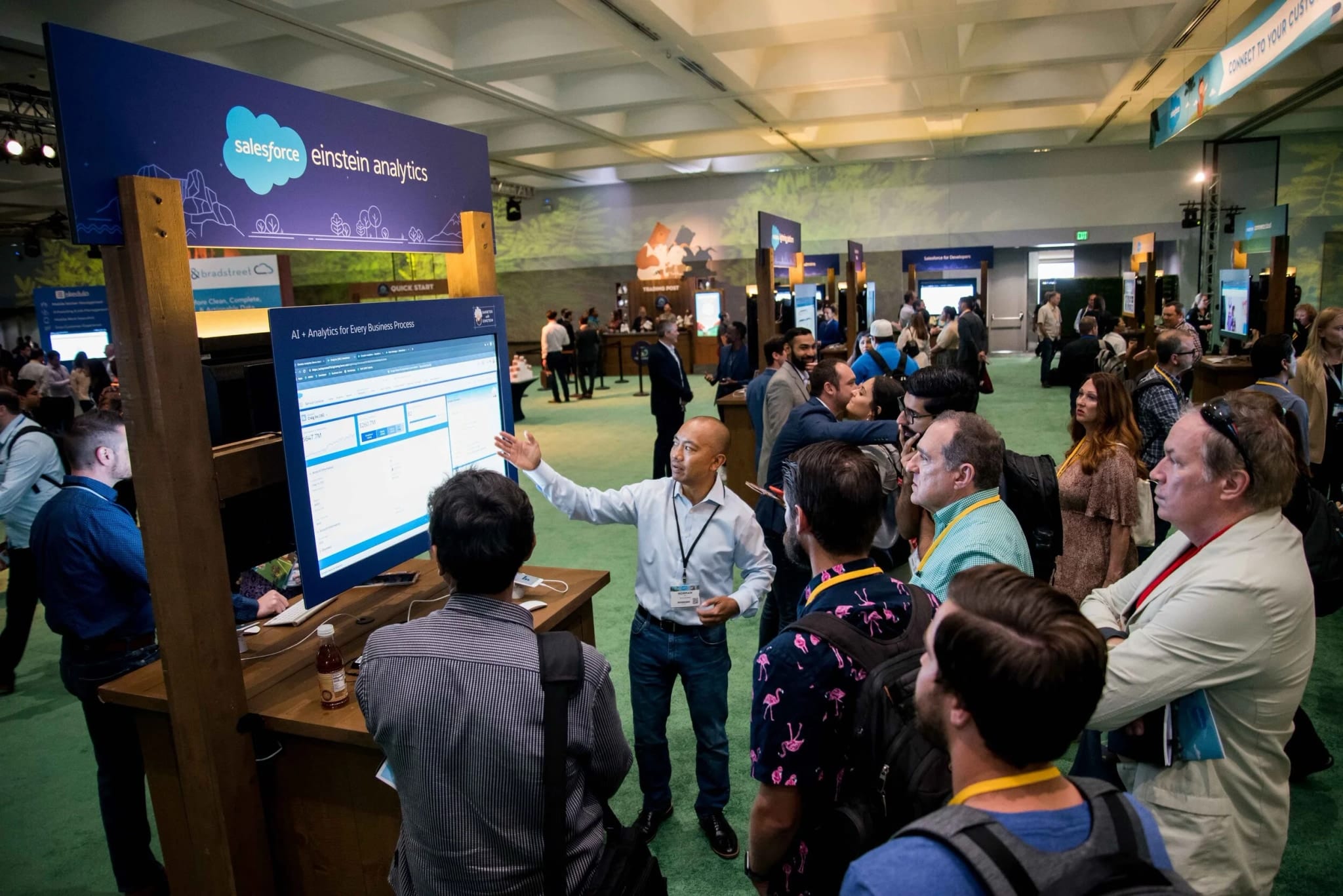 Attendees at demo stations on the Salesforce Einstein Analytics trade show floor